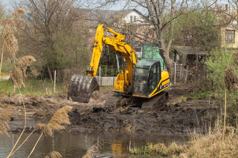 excavator digging fish lake